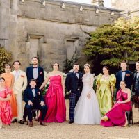 The Morris bridal party featuring a variety of colourful bridesmaid dresses and formal kilt outfits tailored by Nice Alter.